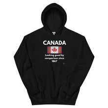 Load image into Gallery viewer, 'Canada: Looking Good By Comparison Since 1867' Unisex Hoodie