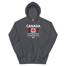 Load image into Gallery viewer, 'Canada: Looking Good By Comparison Since 1867' Unisex Hoodie